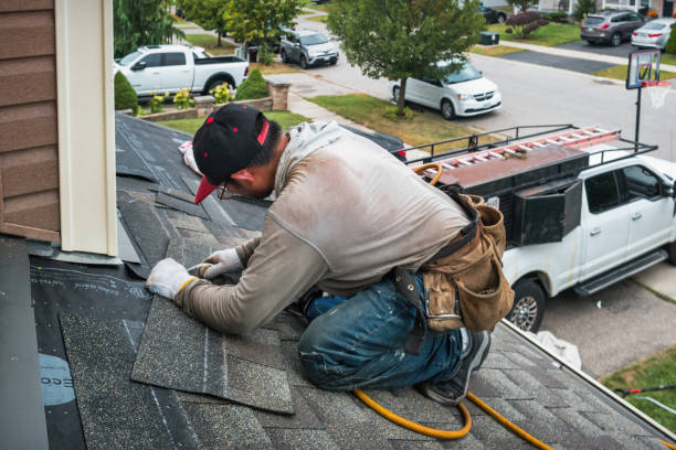 Professional Roof Replacement technician working in Boomer, WV